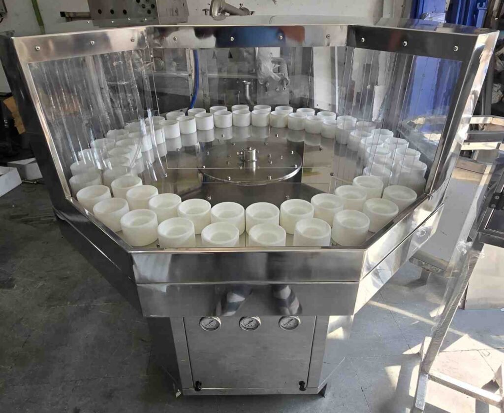 Rotary bottle washing machine